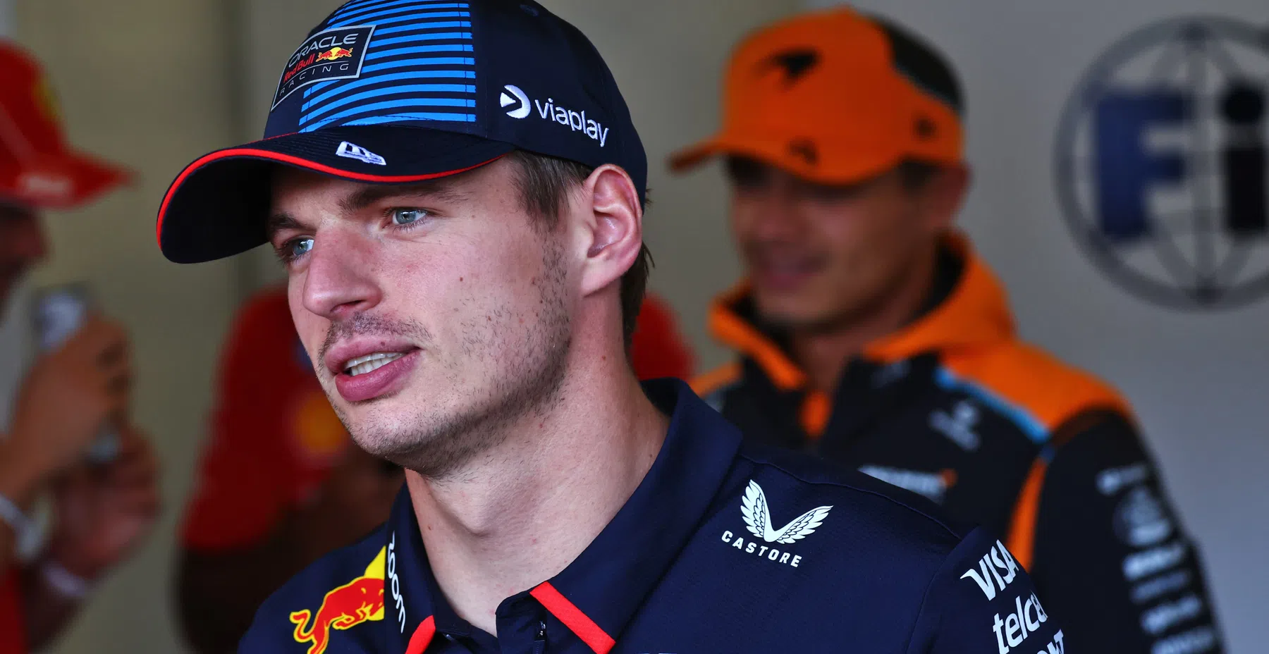 Max Verstappen and George Russell at the Singapore GP press conference